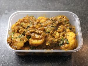 Aloo Gobi in a Takeaway Container